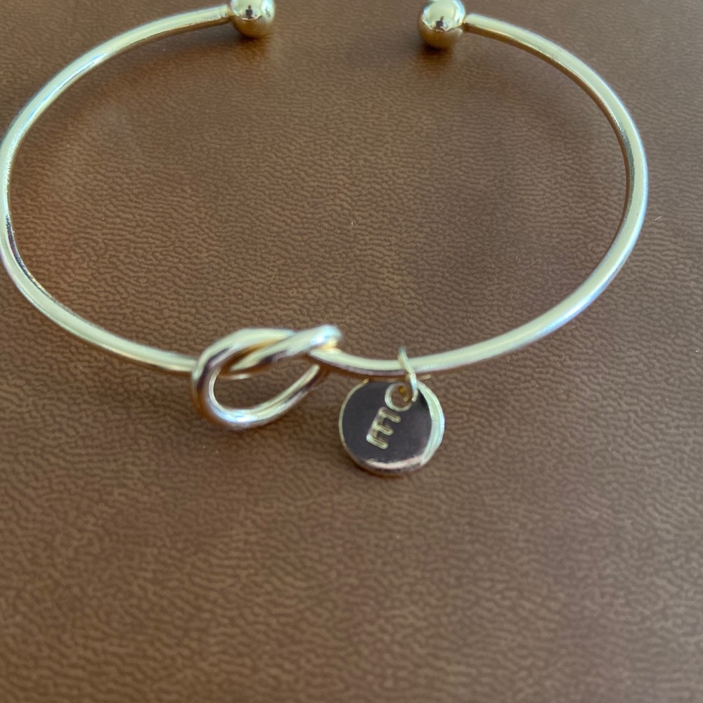 Knotted “E” bracelet